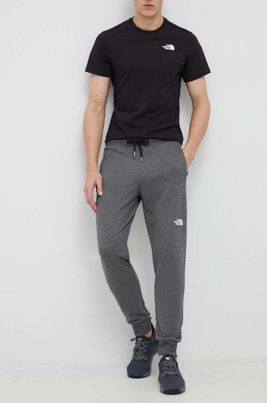 Donji dio trenirke The North Face pletivo siva NF0A4T1FDYY1