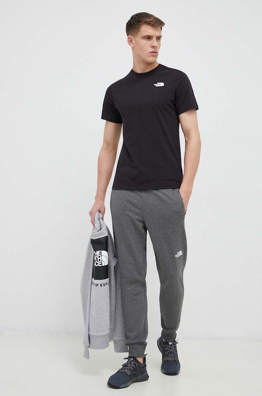 Donji dio trenirke The North Face NF0A4T1FDYY1 siva SS23