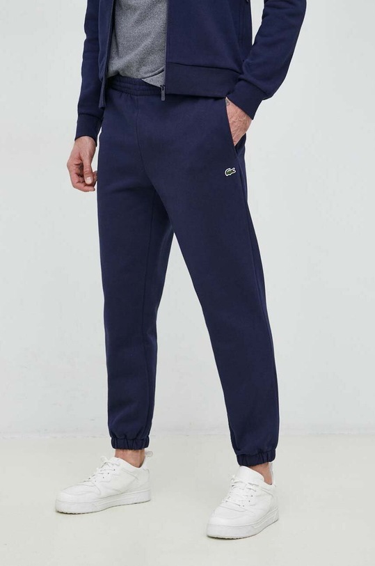 Spodnji del trenirke Lacoste Pletenina mornarsko modra XH9610