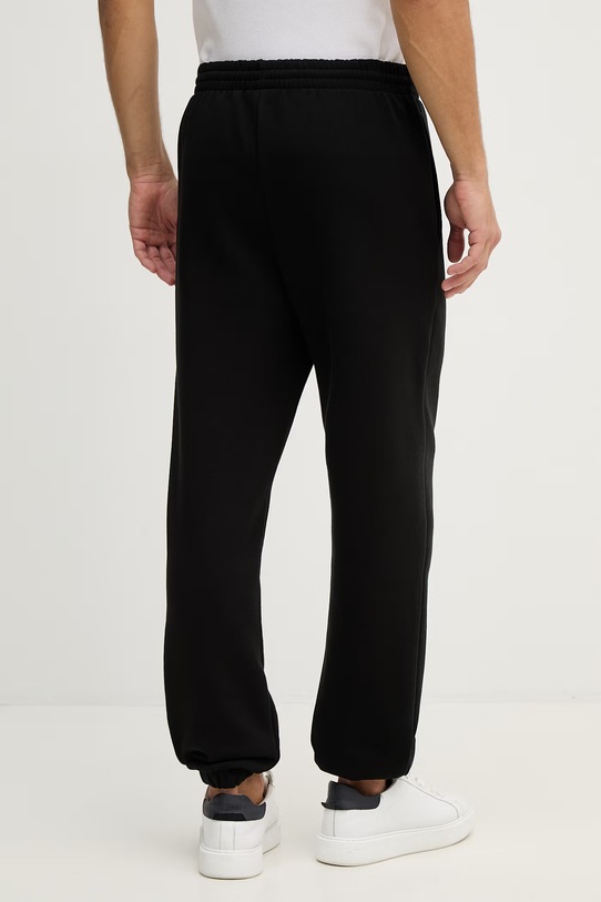 Odzież Lacoste spodnie dresowe XH9610 czarny