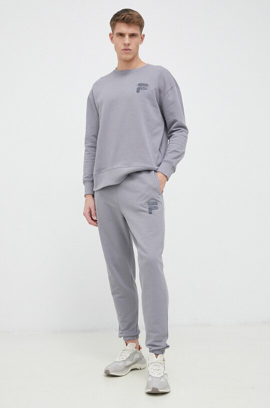Хлопковые спортивные штаны Fila FAM0338 серый SS23