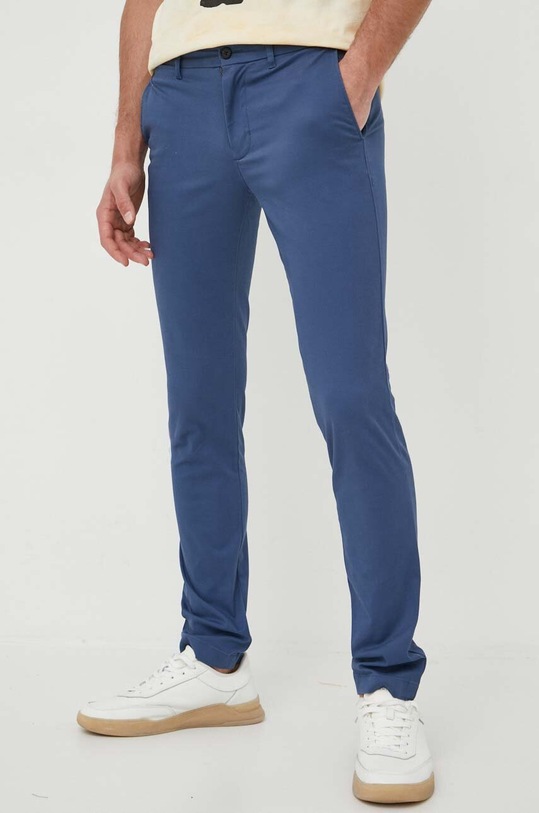 Tommy Hilfiger spodnie z elastanem niebieski MW0MW26619.PPYX