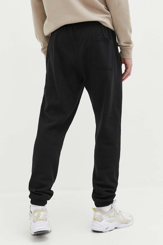 Odzież Billabong spodnie dresowe x Keith Haring ABYNP00153 czarny