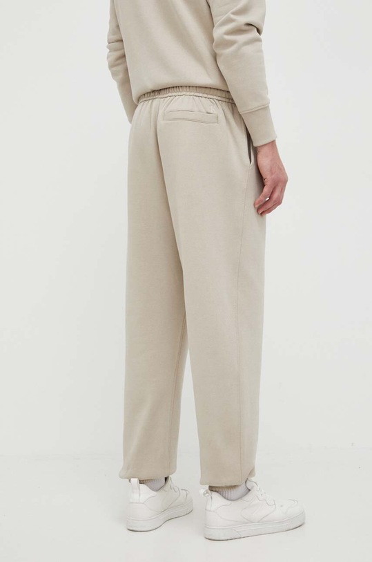 Odzież Calvin Klein Jeans spodnie dresowe J30J322925.PPYX beżowy