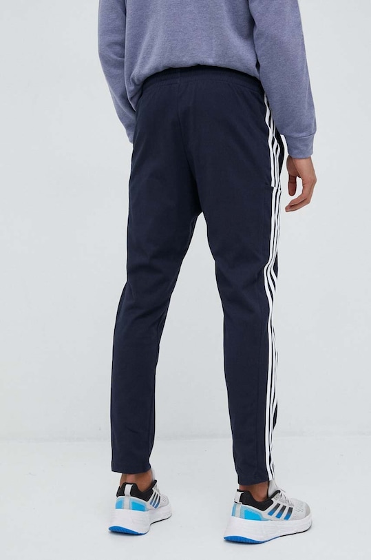 Oblečenie Tréningové nohavice adidas Essentials IC0045 tmavomodrá