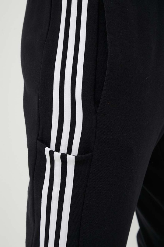 adidas spodnie dresowe bawełniane Essentials czarny IC0050