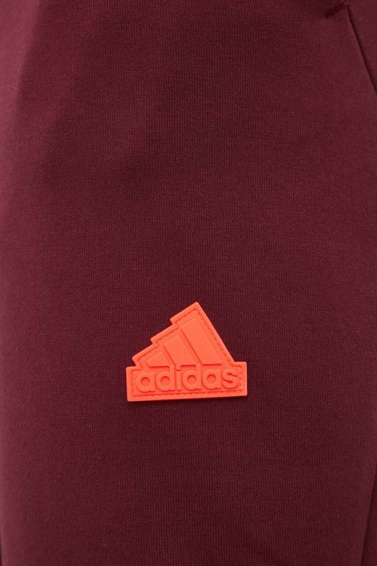 Tepláky adidas burgundské IC8035