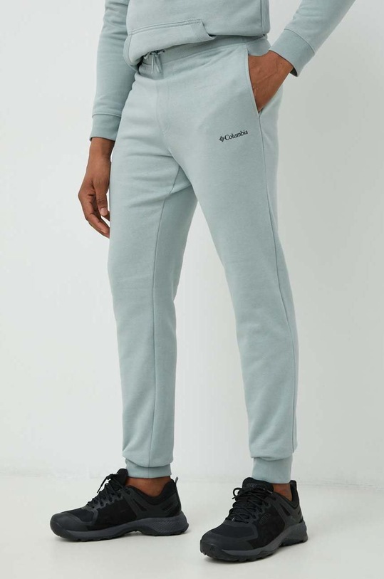 Tepláky Columbia CSC Logo s elastanom tyrkysová 1911601.SS23
