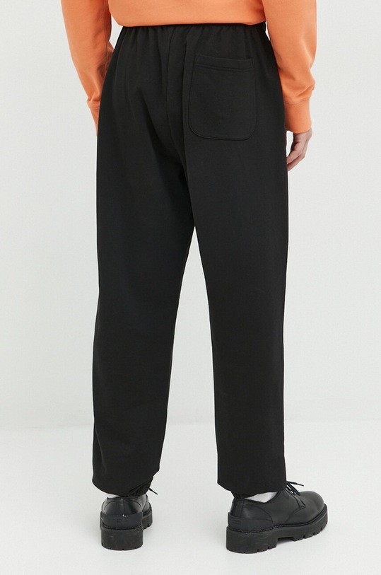 Oblečení Bavlněné tepláky Tommy Jeans DM0DM16336.PPYX černá