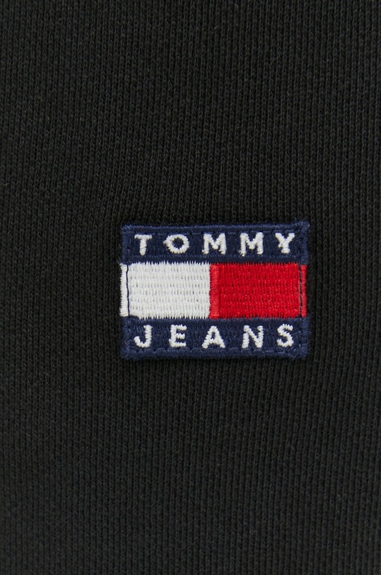 Bavlněné tepláky Tommy Jeans černá DM0DM16336.PPYX