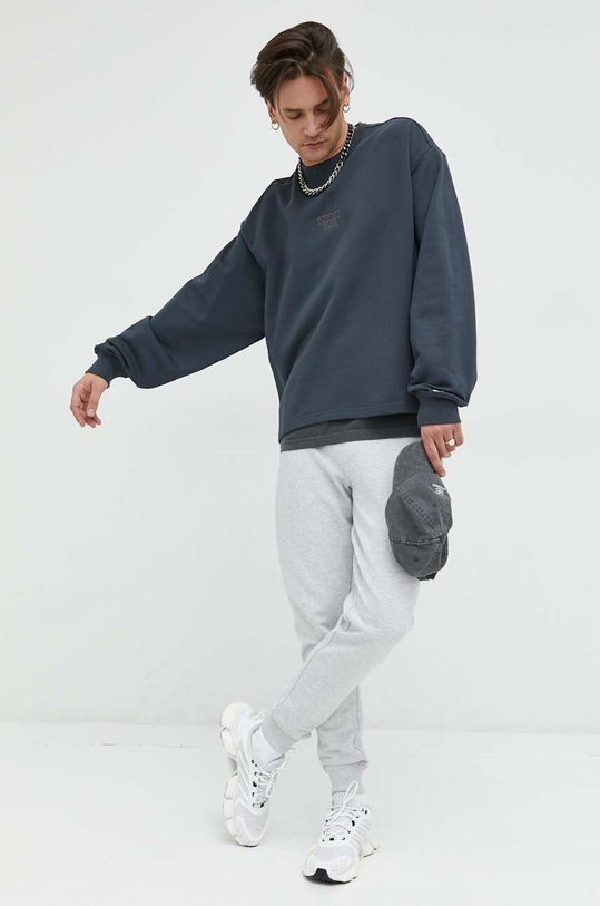 Tommy Jeans spodnie dresowe bawełniane DM0DM16337.PPYX szary SS23