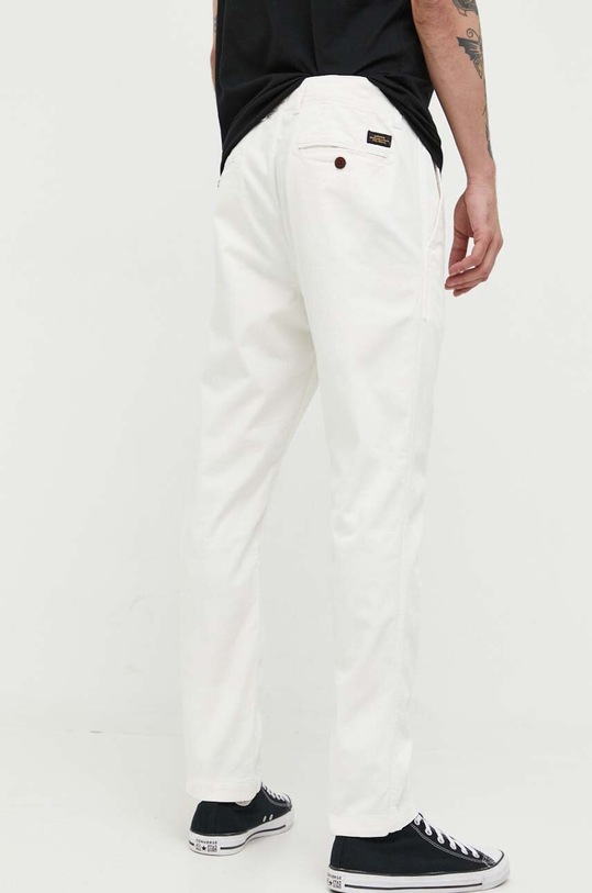 Odzież Superdry jeansy Officers M7011022A.39E beżowy