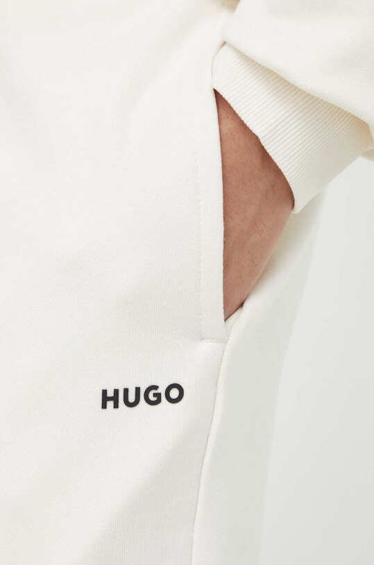 Бавовняні спортивні штани HUGO 50489617 бежевий