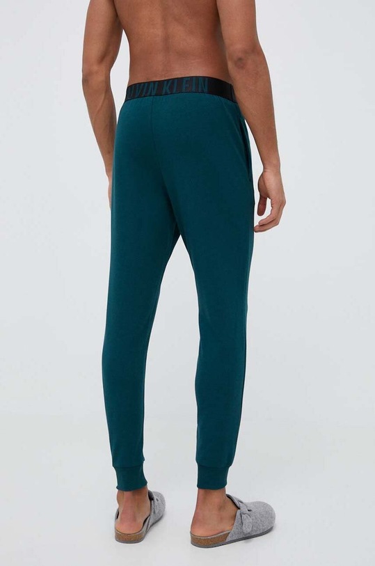 Odzież Calvin Klein Underwear spodnie lounge 000NM1961E.PPYX zielony