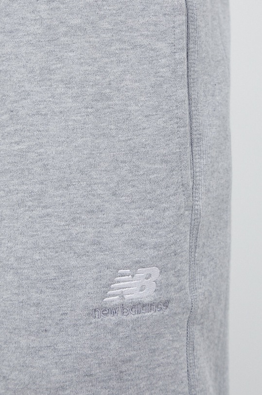 New Balance spodnie dresowe bawełniane szary MP31503AG