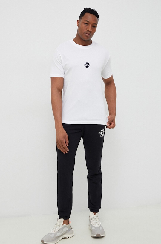 Tepláky New Balance MP31515BK černá SS23