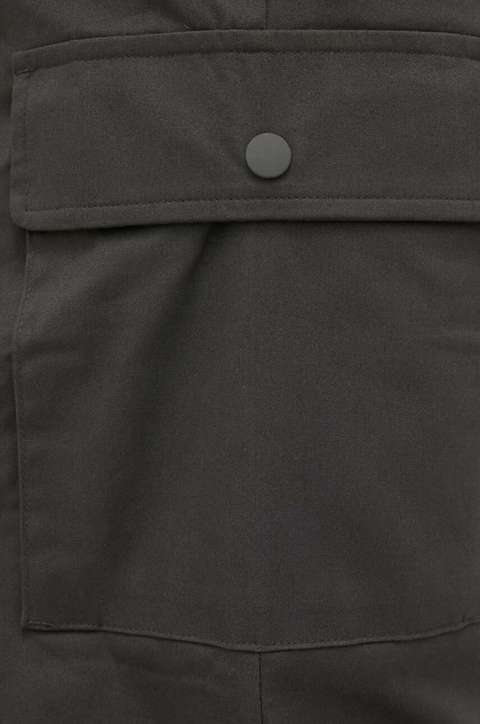 Kalhoty New Balance zelená MP31526COG