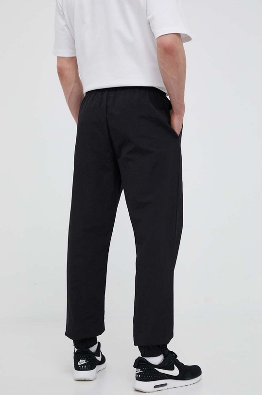 Îmbrăcăminte Hummel pantaloni de trening 219405 negru