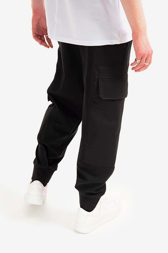 Odzież Neil Barett spodnie Hybrid Workwear Loose Sweatpants BJP019CH.S018S.01 czarny