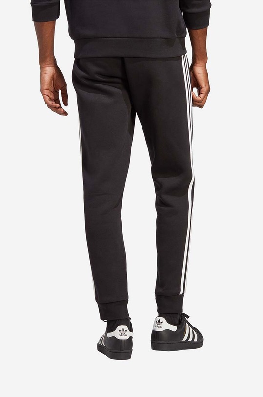 Ρούχα Παντελόνι φόρμας adidas Originals IA4794 μαύρο