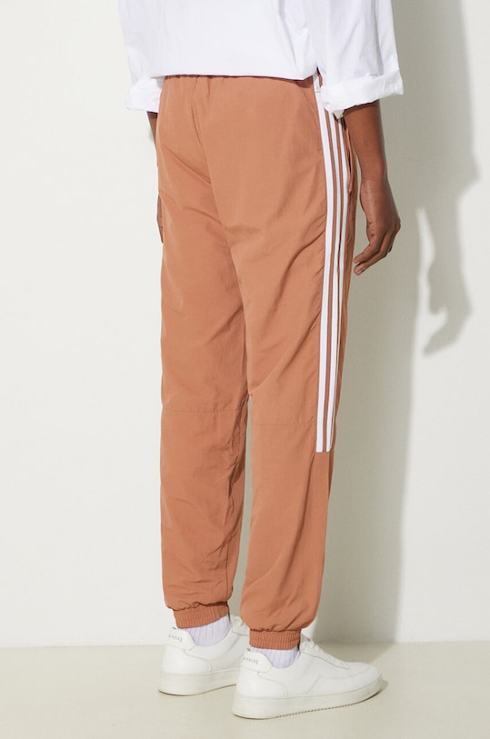 Odzież adidas Originals spodnie dresowe Adicolor Classics Lock-Up Trefoil Track Pants IA6356 brązowy