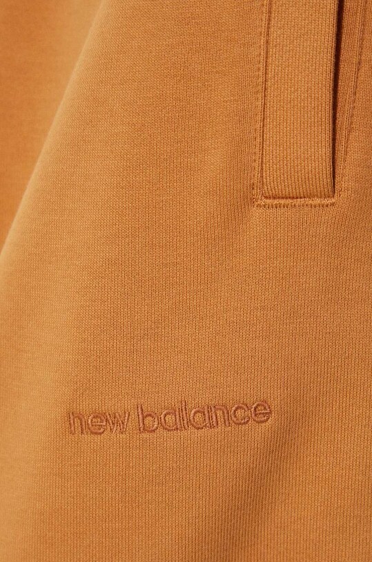 New Balance cotton joggers MP23551TOB orange
