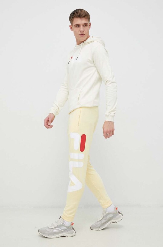 Fila spodnie dresowe Bronte FAU0069.SS23 żółty SS23