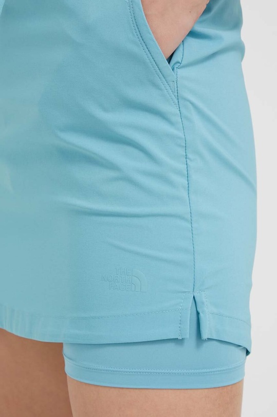 Športna obleka The North Face Never Stop Wearing Adventure NF0A7QCQLV21 turkizna