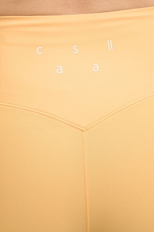 Casall pantaloncini sportivi da donna giallo 23149.