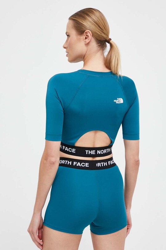 Oblečenie Tréningové tričko The North Face NF0A824FEFS1 tyrkysová