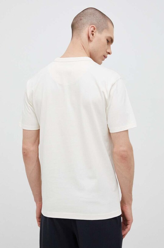 Odzież New Balance t-shirt bawełniany MT23567GIE beżowy