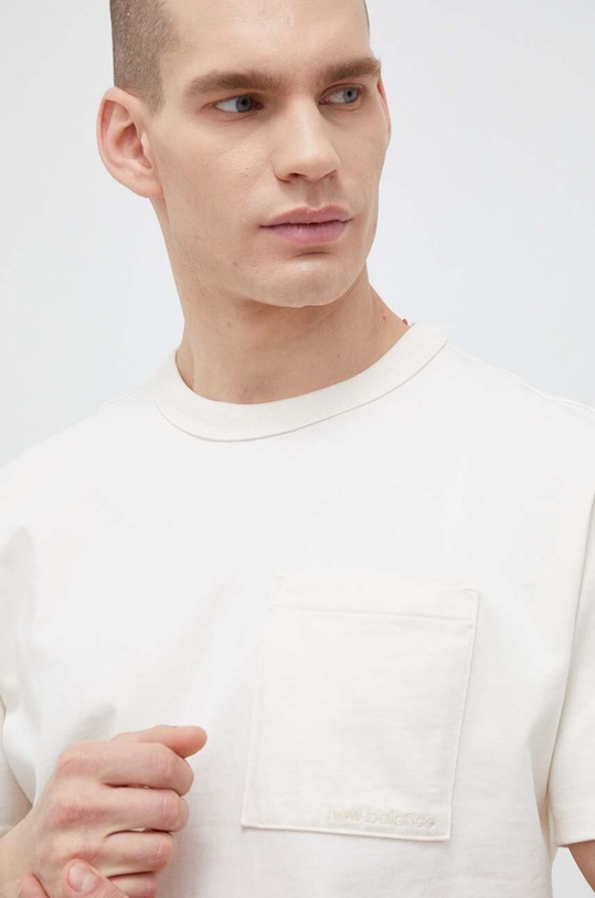 New Balance t-shirt bawełniany beżowy MT23567GIE