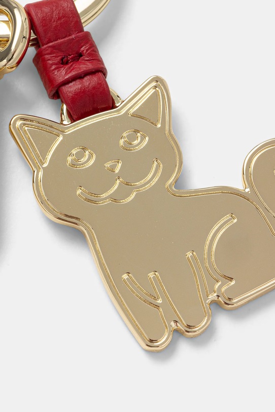 Coccinelle brelok E2.M9K.41.G5.02 złoty AA00