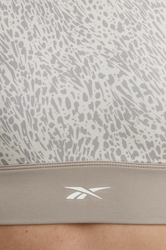 Reebok biustonosz sportowy beżowy 100076048