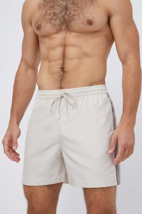 Calvin Klein szorty kąpielowe Planet friendly beżowy KM0KM00810