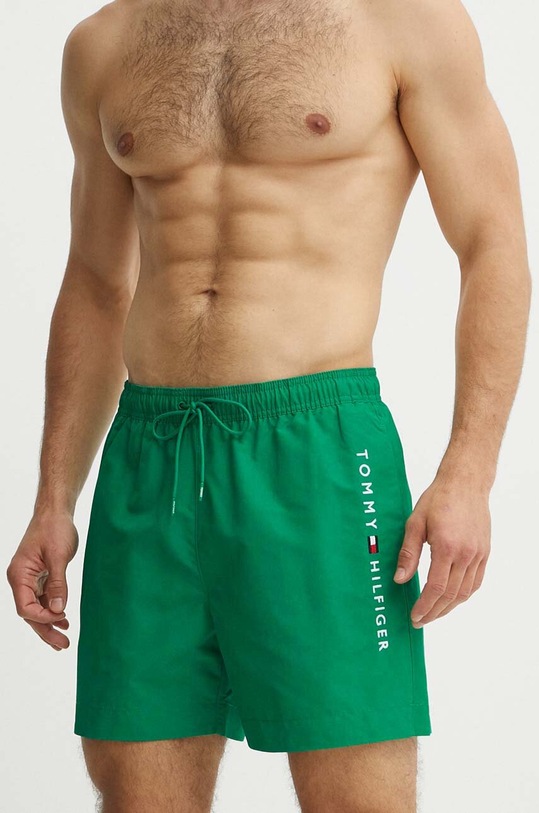Plavkové šortky Tommy Hilfiger UM0UM03258 zelená SS25