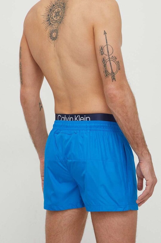 Îmbrăcăminte Calvin Klein pantaloni scurți de baie KM0KM00947 albastru