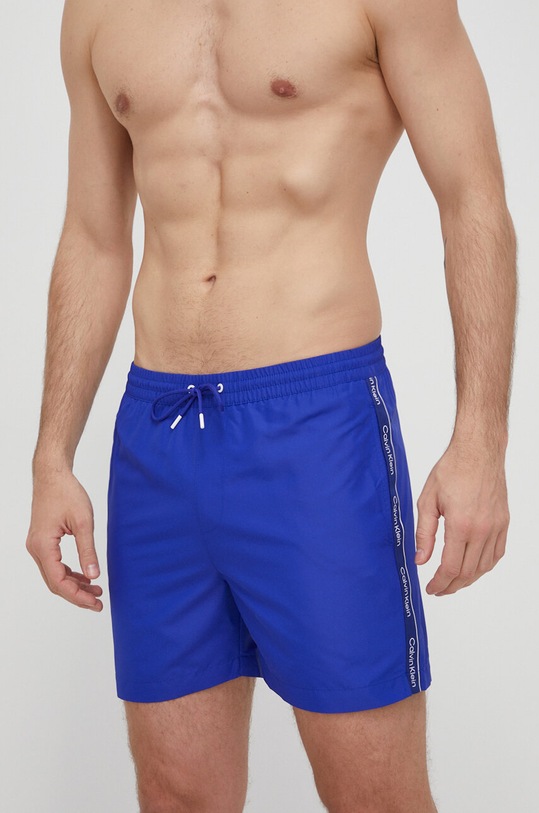 Plavkové šortky Calvin Klein Planet friendly modrá KM0KM00955