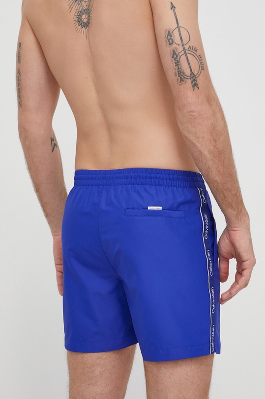 Plavkové šortky Calvin Klein KM0KM00955 modrá SS24