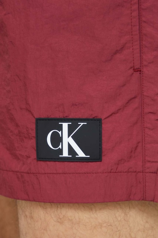 Îmbrăcăminte Calvin Klein pantaloni scurți de baie KM0KM00979 burgundia