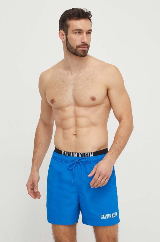 Plavkové šortky Calvin Klein Planet friendly modrá KM0KM00992
