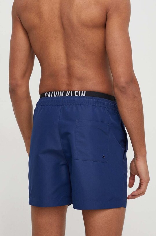 Plavkové šortky Calvin Klein KM0KM00992 tmavomodrá SS24