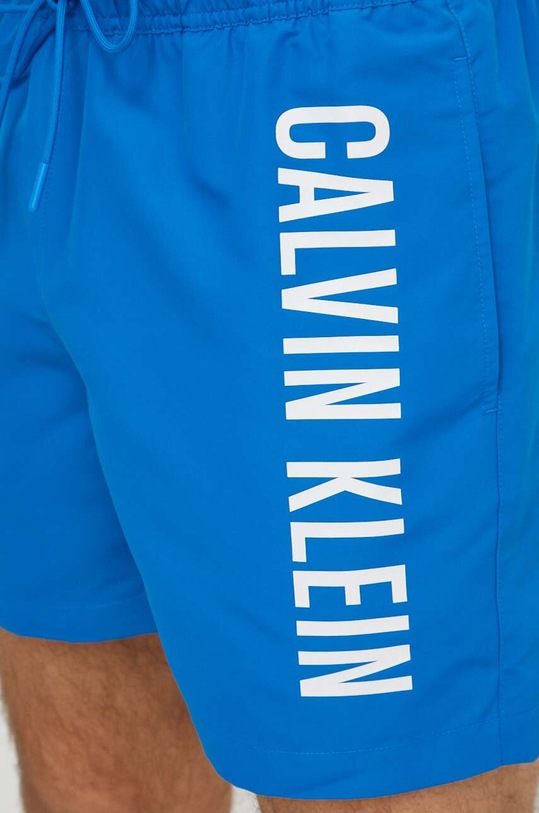Plavkové šortky Calvin Klein modrá KM0KM01004
