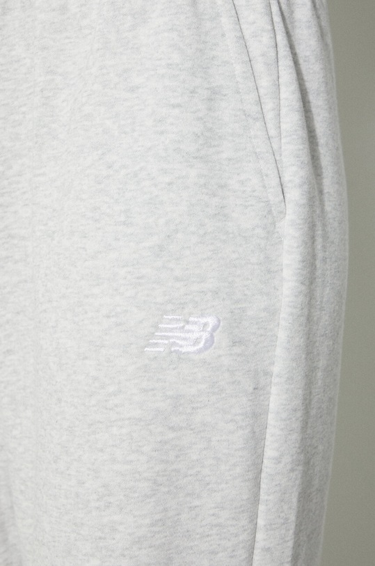 Tepláky New Balance French Terry Crew WP41500AHH šedá