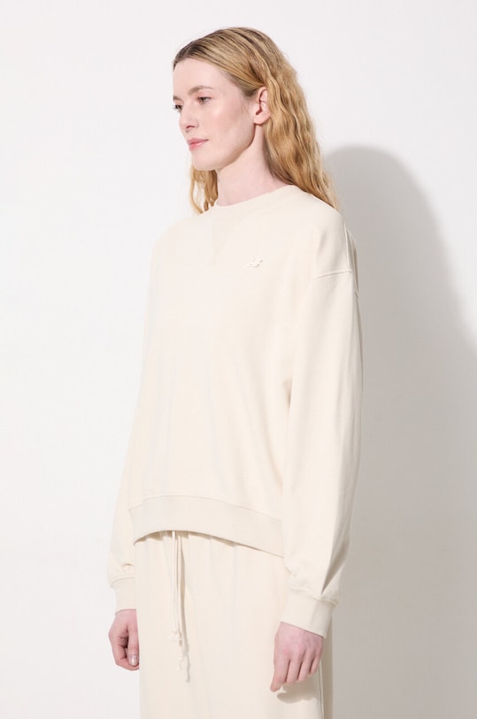 New Balance bluza bawełniana WT41500LIN beżowy WT41500LIN