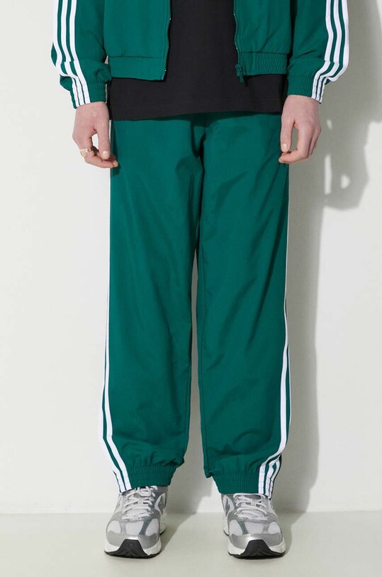 Спортивні штани adidas Originals Adicolor Woven Firebird Track Top бірюзовий IT2497