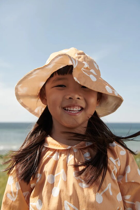 Παιδικό αναστρέψιμο καπέλο Liewood Amelia Reversible Sun Hat πορτοκαλί LW17697