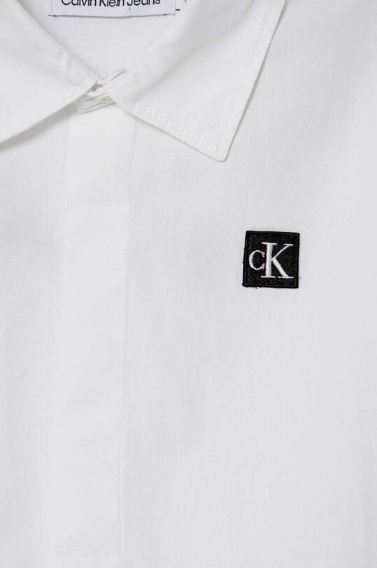 Dečki Otroška bombažna srajca Calvin Klein Jeans IB0IB01962.104.116.PPYH bela
