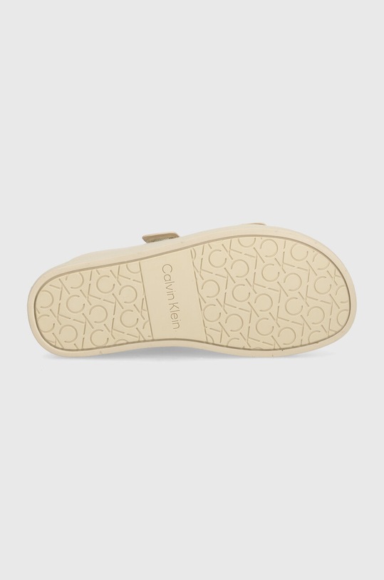 Calvin Klein klapki skórzane FLAT ADJ SLIDE CALVIN MTL LTH HW0HW01954 beżowy