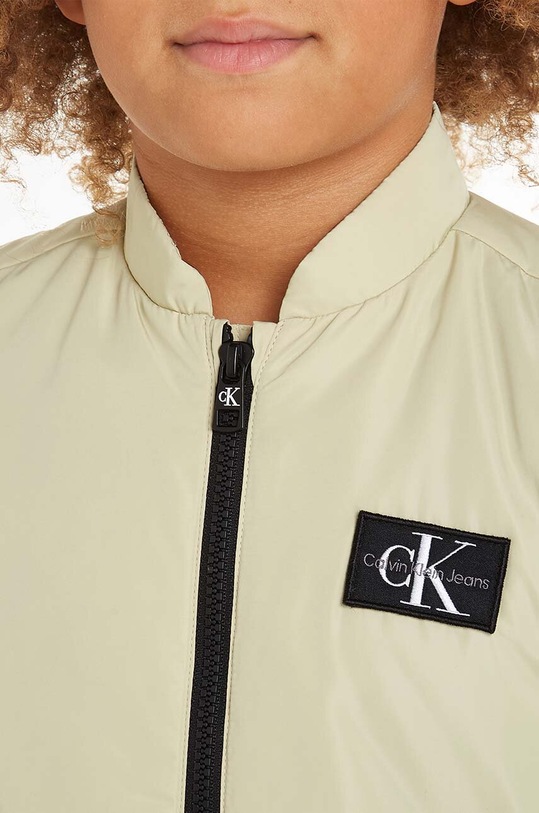 Дитяча безрукавка Calvin Klein Jeans IB0IB02085.PPYH бежевий